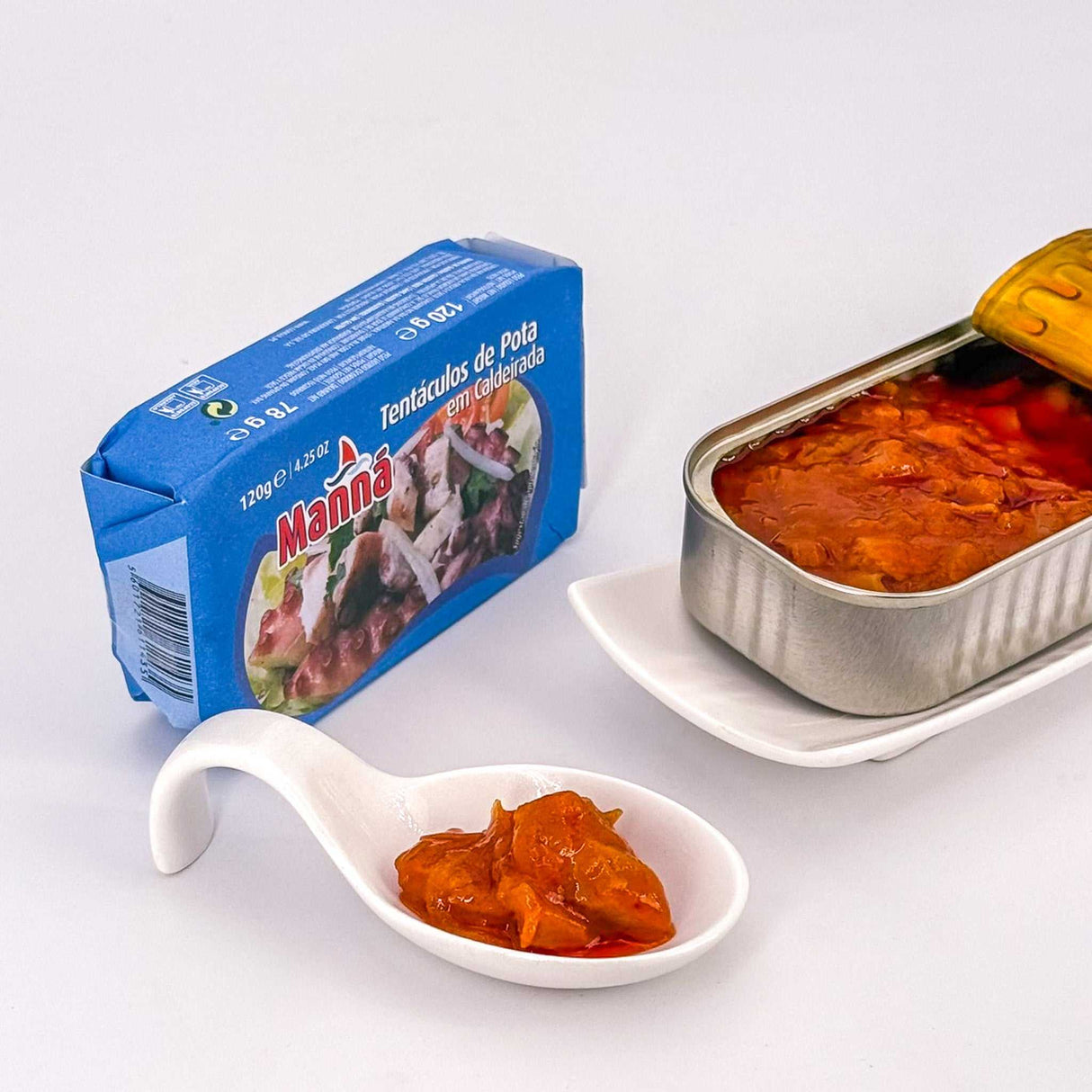 Tentakel vom Jumbo-Kalmar in American-Sauce oben