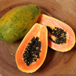 Papaya ganz und geschnitten