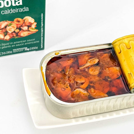 Tentakel vom Jumbo-Kalmar in American-Sauce oben